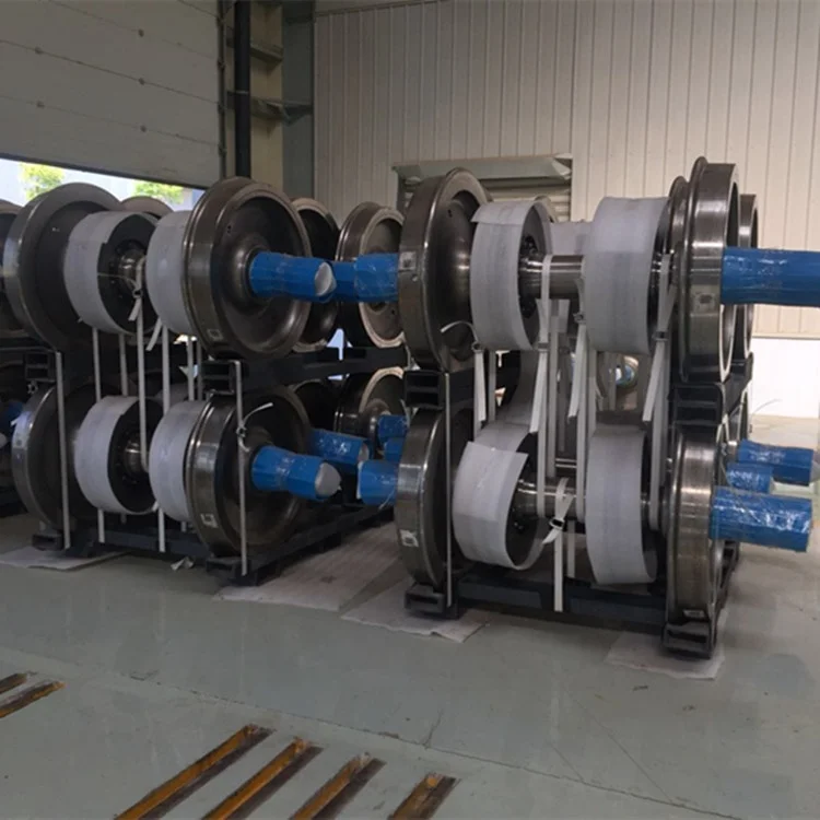 Train railway wheelset/wheel pair assembly including railway wheel and axle