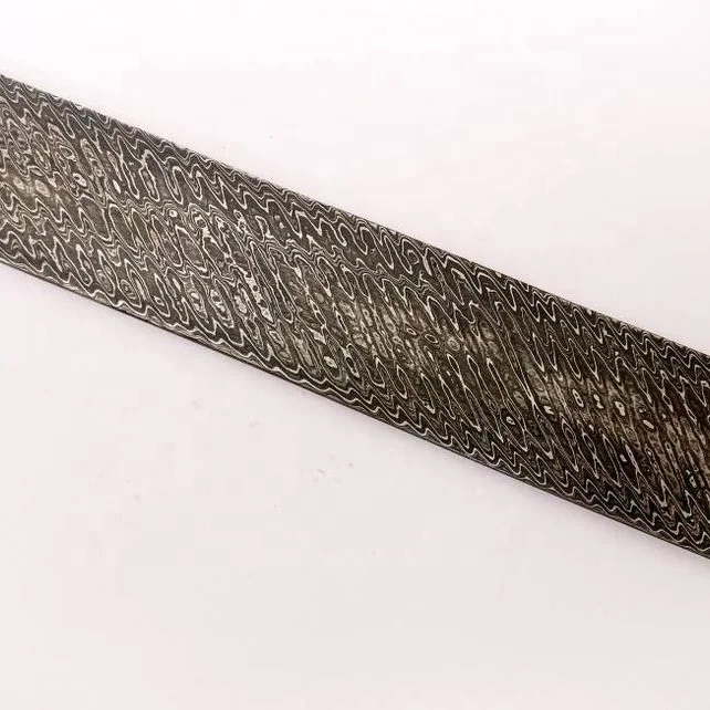 
Нож ручной работы из дамасской стали с лезвием зигзаг 