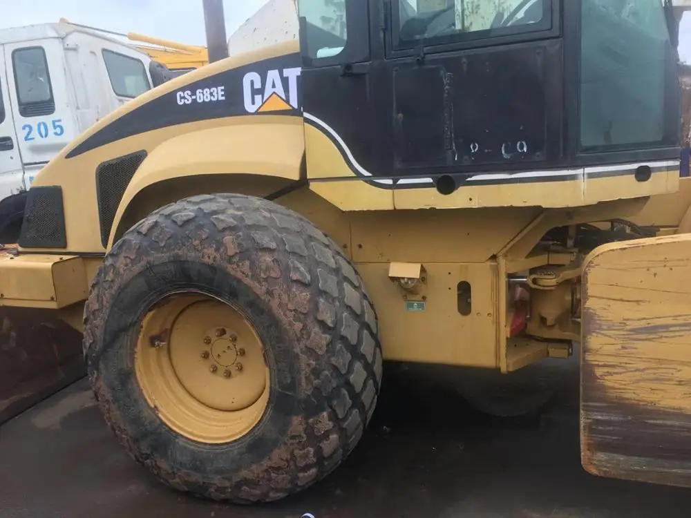  Б/у дорожный каток CS683E CATERPLAR спецификация