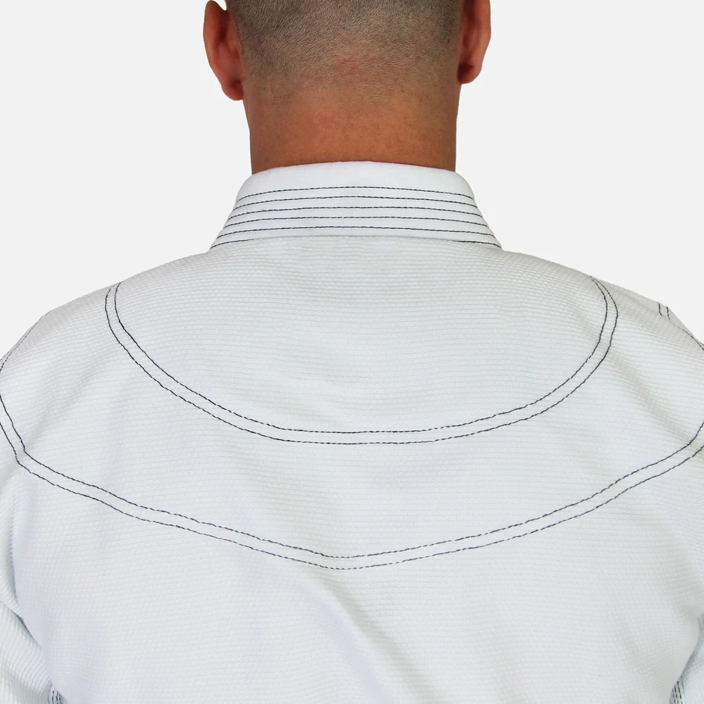 Latest Design Jiu Jitsu Uniform Made In 100% Cotton White color Adult Bjj Gi With Customized Patch Logo