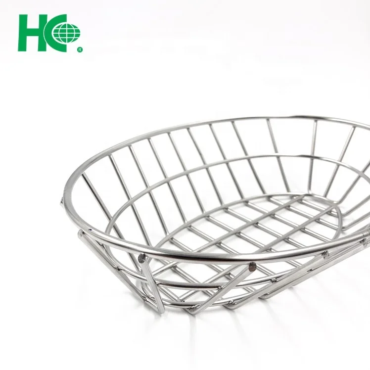 oval fast food restaurant serving metal bread basket