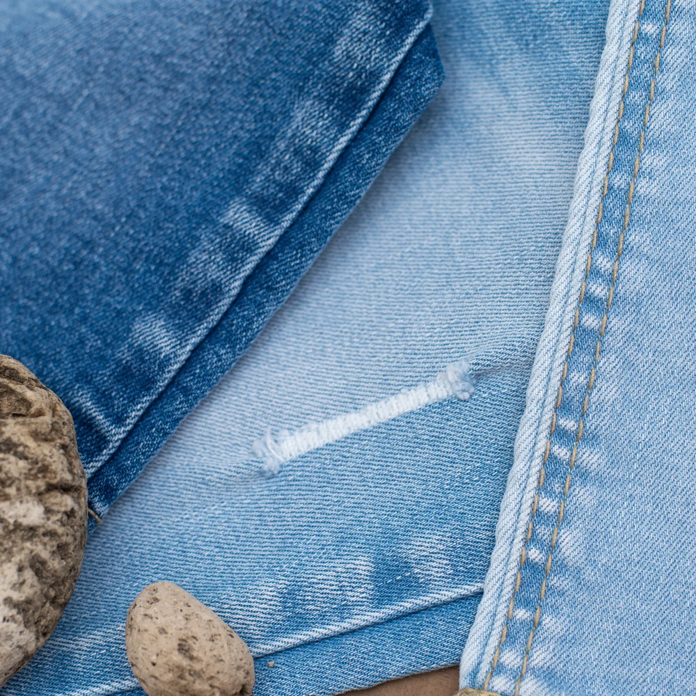  Хлопчатобумажная джинсовая ткань/эластичная ткань для оптовой продажи (TL319155) из Вьетнама с тщательно упакованной и быстрой реакцией