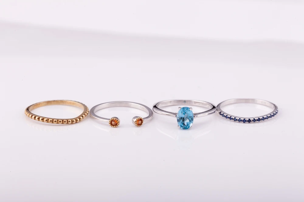 Stackable ring comes with 4 pieces silver 925 with natural blue topaz and orange sapphire and factory price