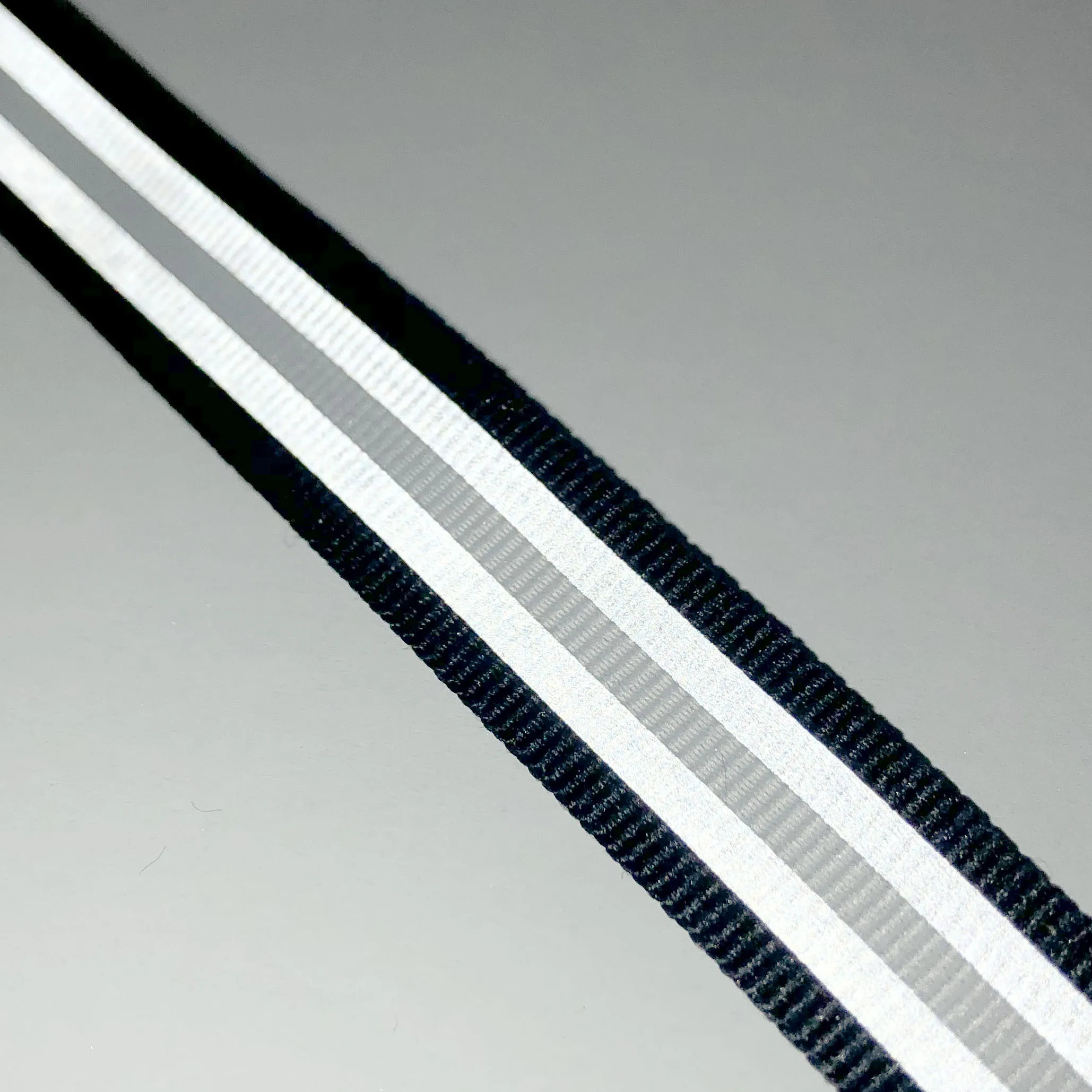 
JL-DEMO-WFJ-B0271 Jacquard webbing with reflective film for sportswear and fashion clothings 