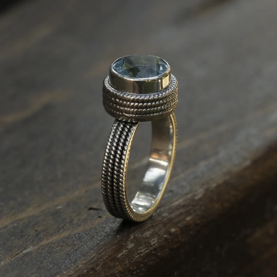 
Round Silver Ring with Blue Topaz 