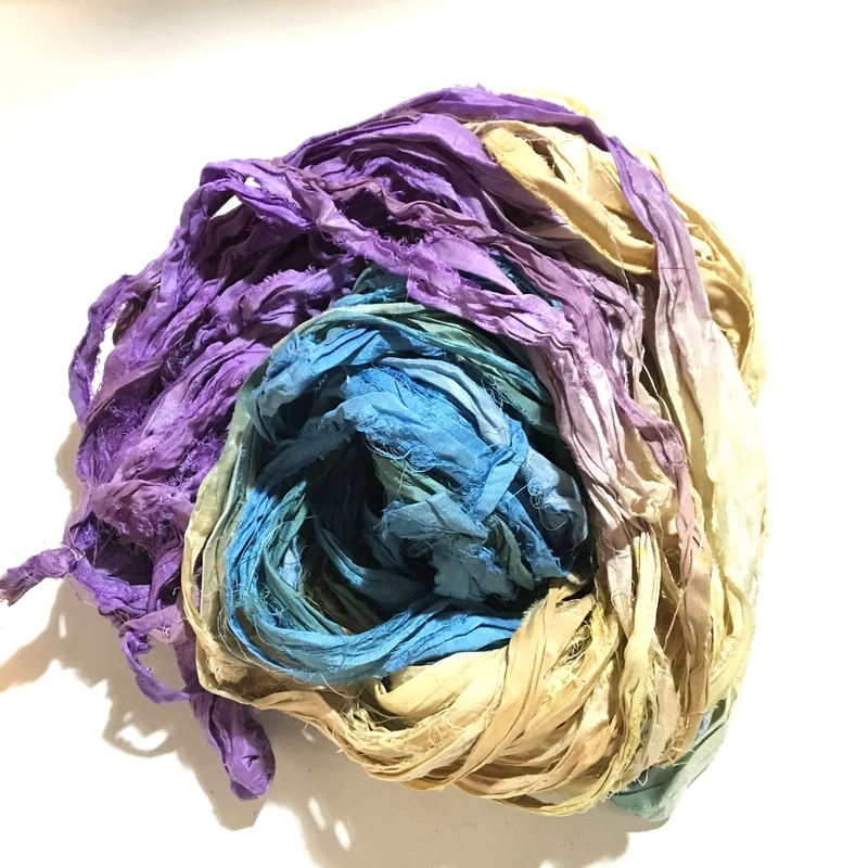 sari silk ribbon made from recycled silk sari available in 100 gram skeins suitable for yarn and fibre stores and for jewellery