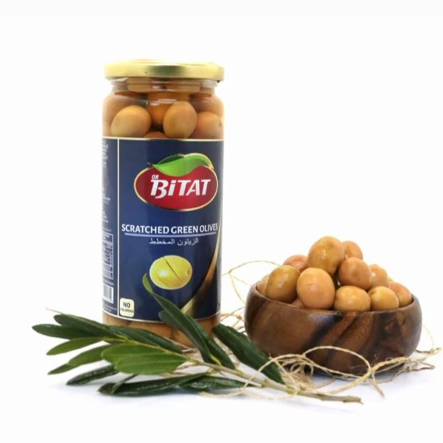 
Турецкие оливки, поцарапанные зеленые оливки 