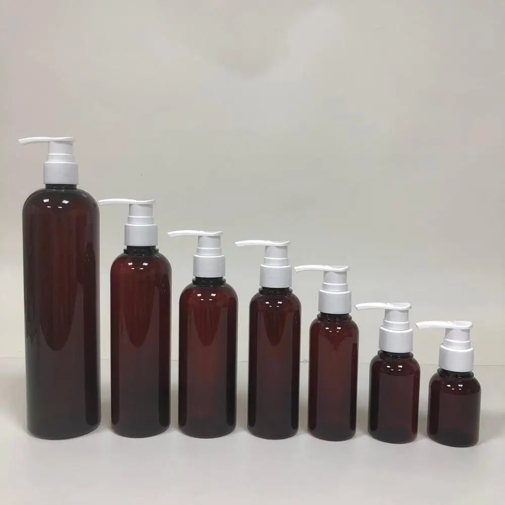 amber plastic PETG round bottle with white pump