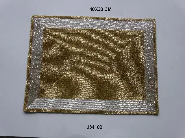 
Glass bead place mats with gold and black patterns other patterns available 