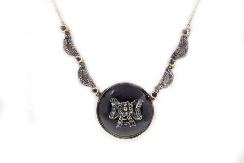 
Diamonds,Blue Sapphires,Onyx Rose Gold and Silver Pendant Necklace 