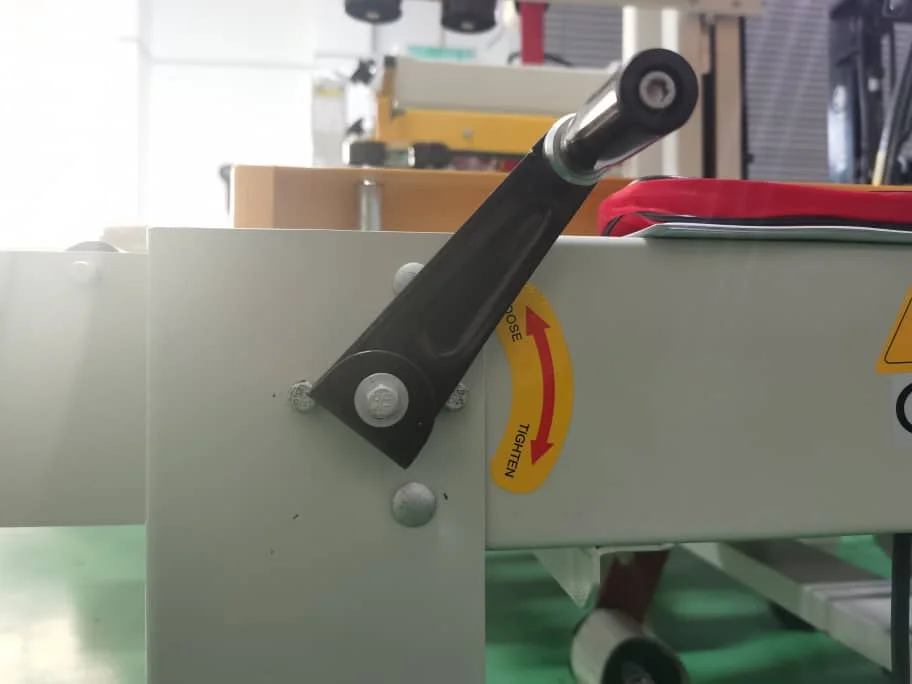 
Malaysia New 250 Kilograms Automatic Box Carton Sealing Machine Packer System Flaps Folding Carton Sealer 