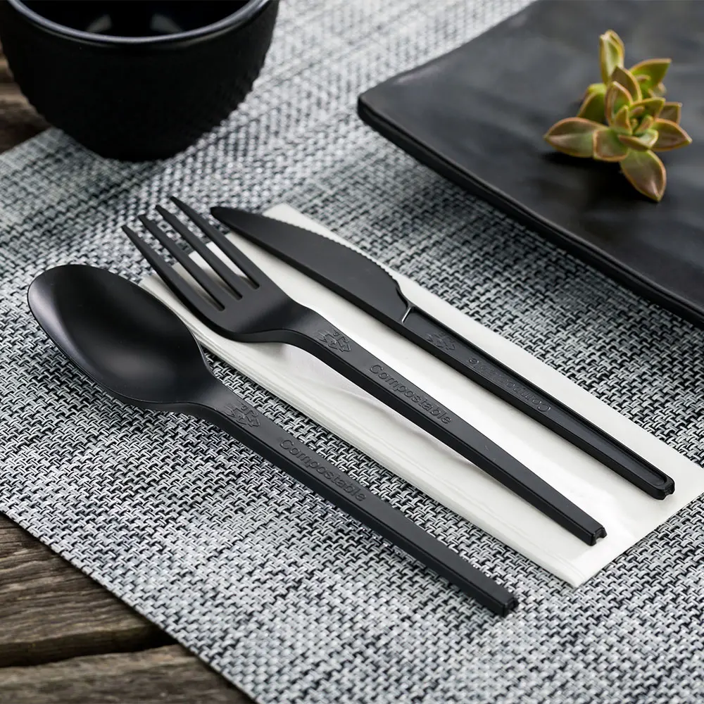 
Basic Nature Black CPLA Plastic Cutlery Set - White Napkin, Heat-Resistant, Compostable - 8 3/4