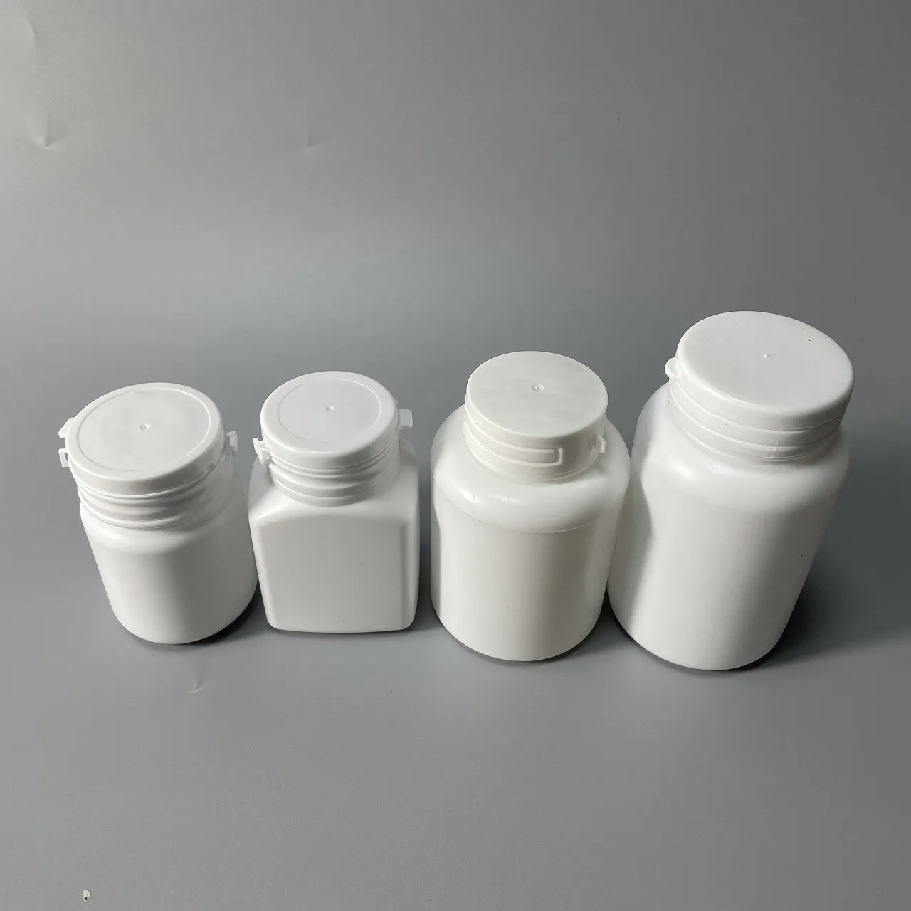 HDPE plastic chewing gum bottle empty pharmaceutical pill capsule bottle with tear off cap