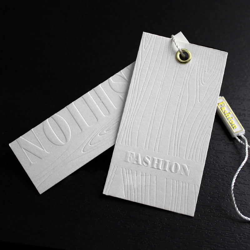 White Card Paper Emboss Logo Garment 3D Hang Tag Custom Sustainable Printed with Swing String Hot Sale Products