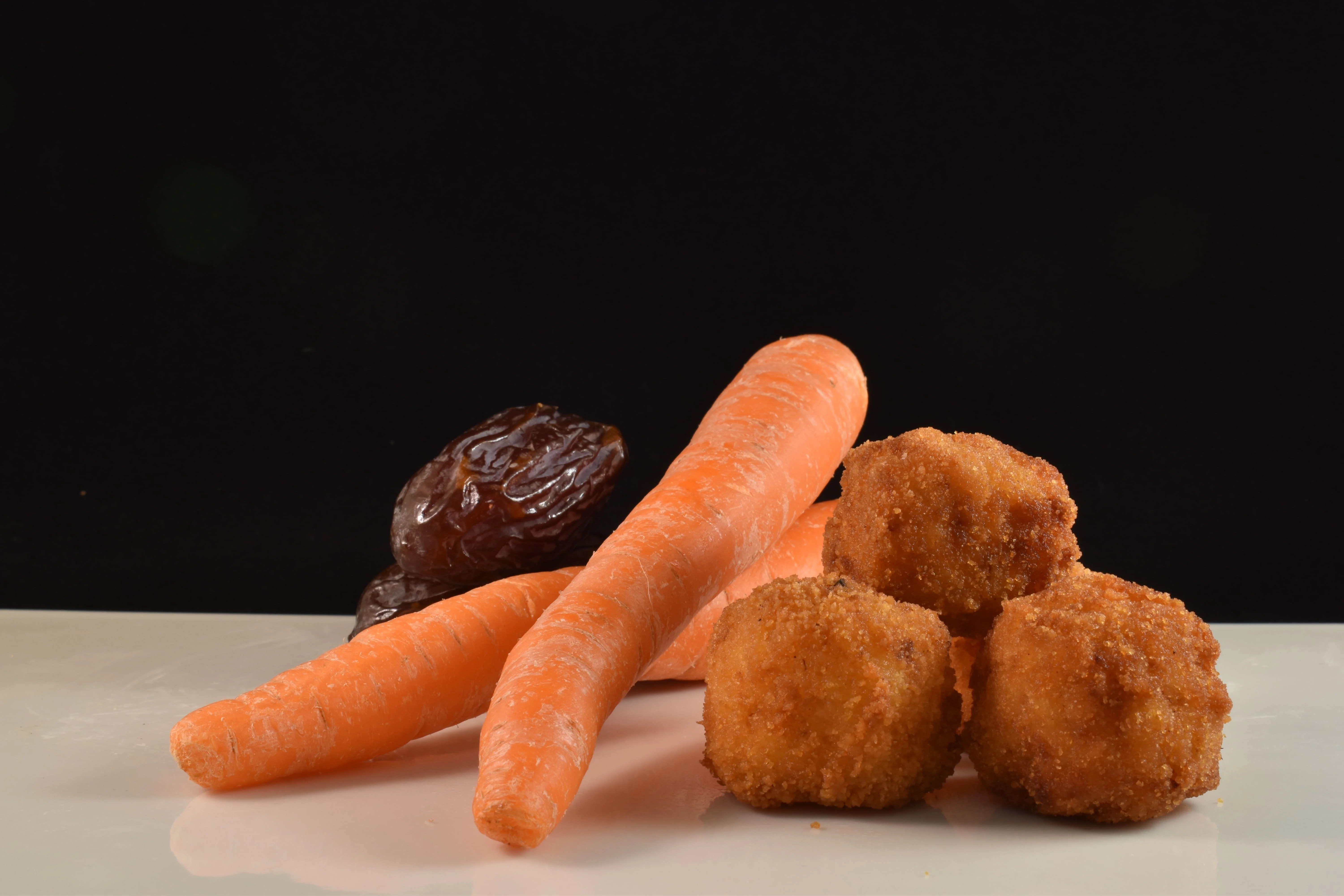 Confit Leek with dates and carrots Frozen Croquettes Frozen organic Snacks handmade typical delicatessen gourmet from Spain.