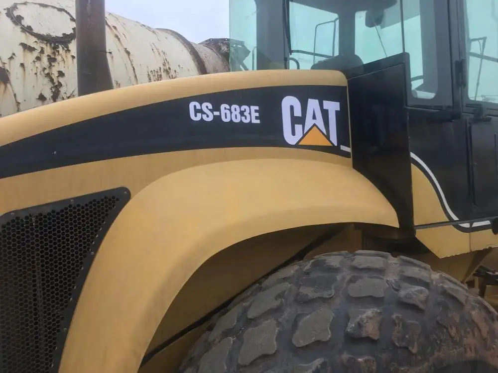  Б/у дорожный каток CS683E CATERPLAR спецификация