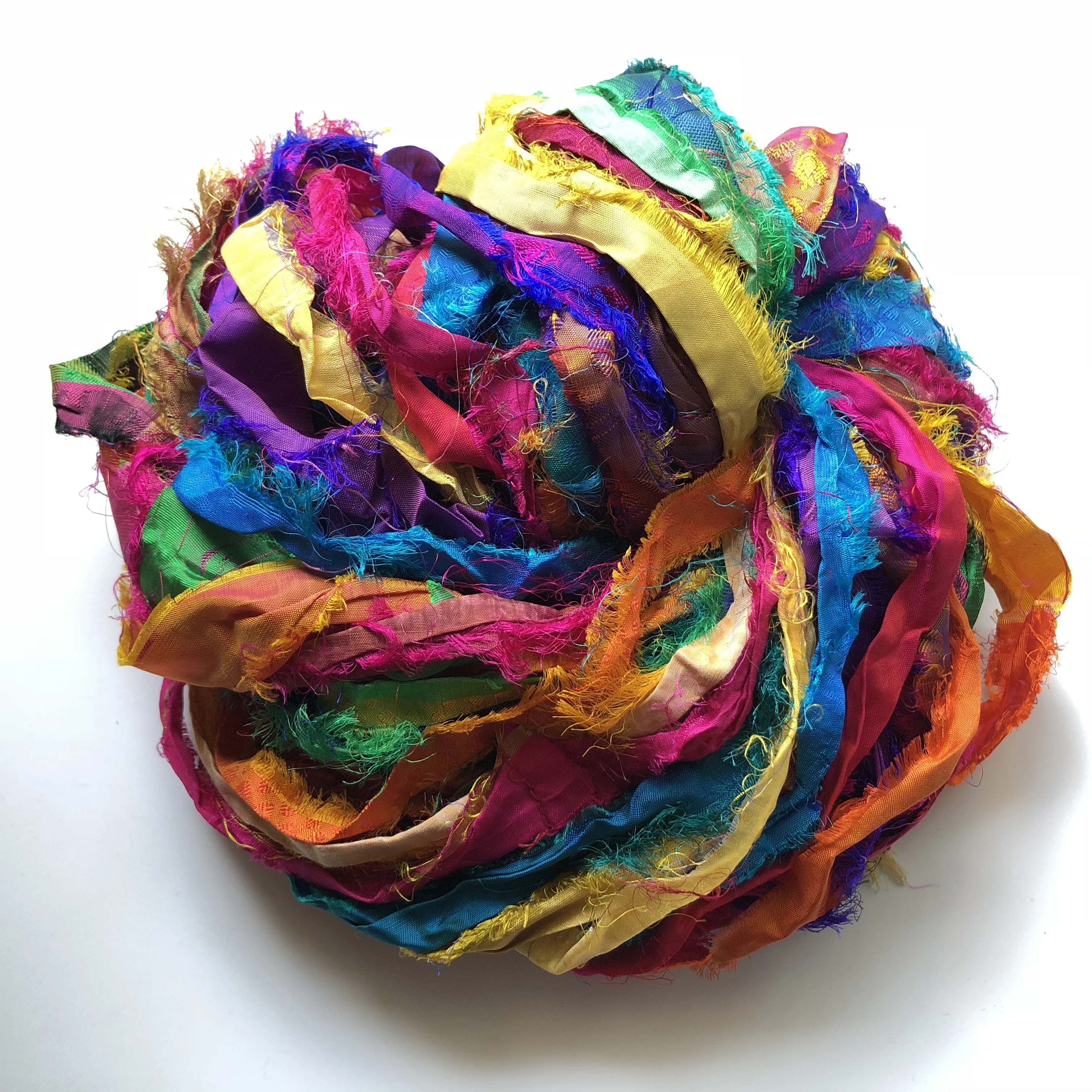 sari silk ribbon made from recycled silk sari available in 100 gram skeins suitable for yarn and fibre stores and for jewellery