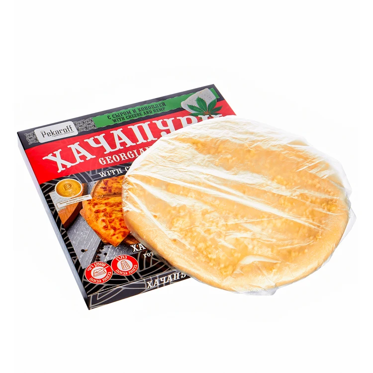 Freshly frozen pie with delicate melted cheese Khachapuri in Svaneti ready to eat natural products, pizza