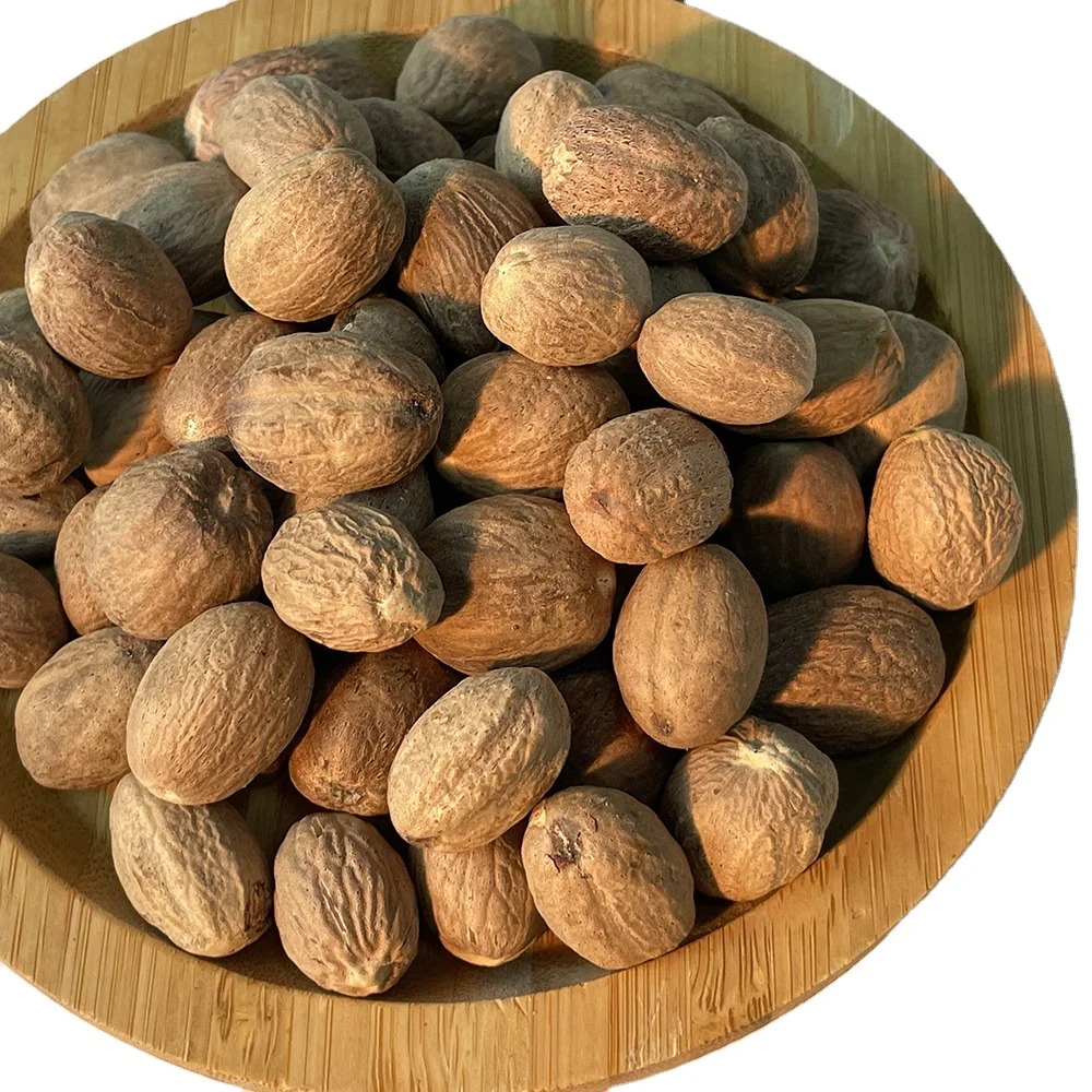 Лидер продаж 2021 экспортные качественные травы и специи коричневого цвета сушеные фасоль или порошок Muscade мускатный орех для оптовой продажи