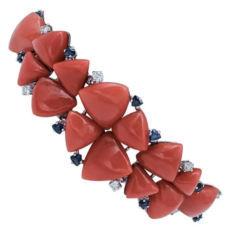 
Diamonds, Blue Sapphires, Coral, 14 Karat White Gold Bracelet 