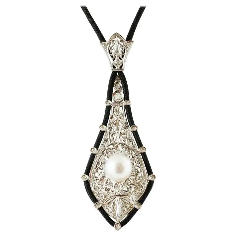 
South Sea Pearl, Diamonds, White Gold Pendant and Black Neck Cord 