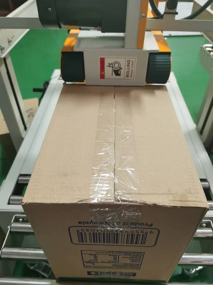 
Food And Beverage Factory And Food Shop Use Semi Auto Top And Side Belt Carton Sealer 