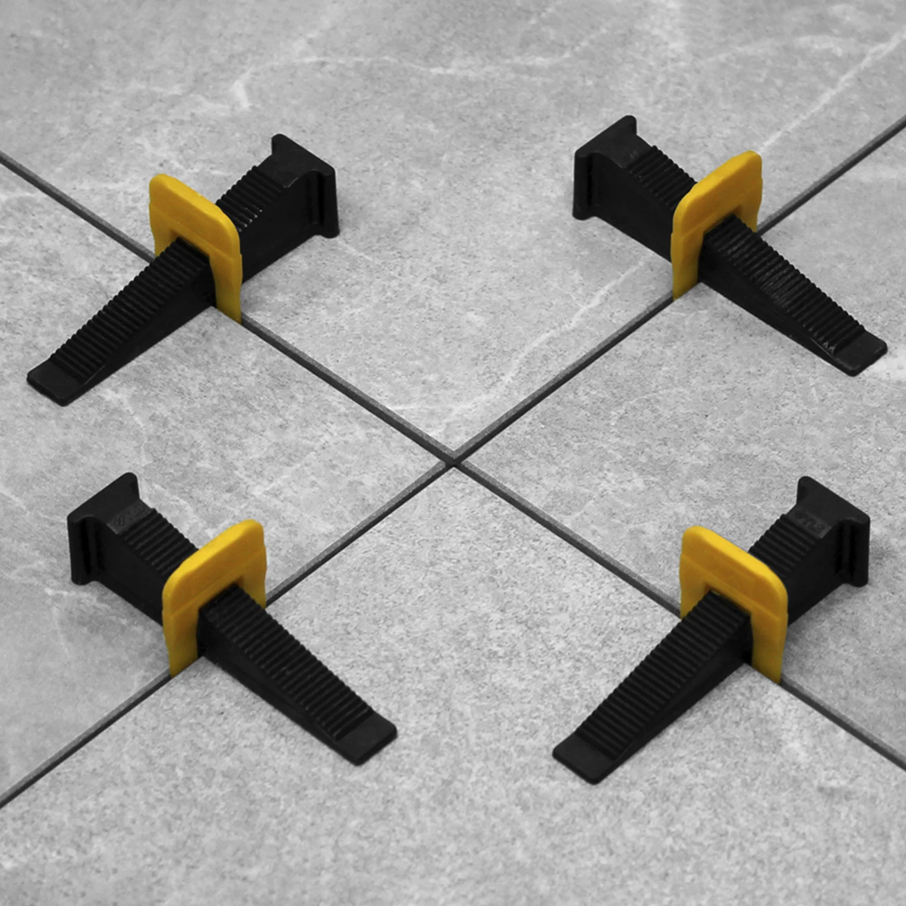 Plastic tile leveling wedges improves the quality of the cladding allowing you to make the surface completely flat