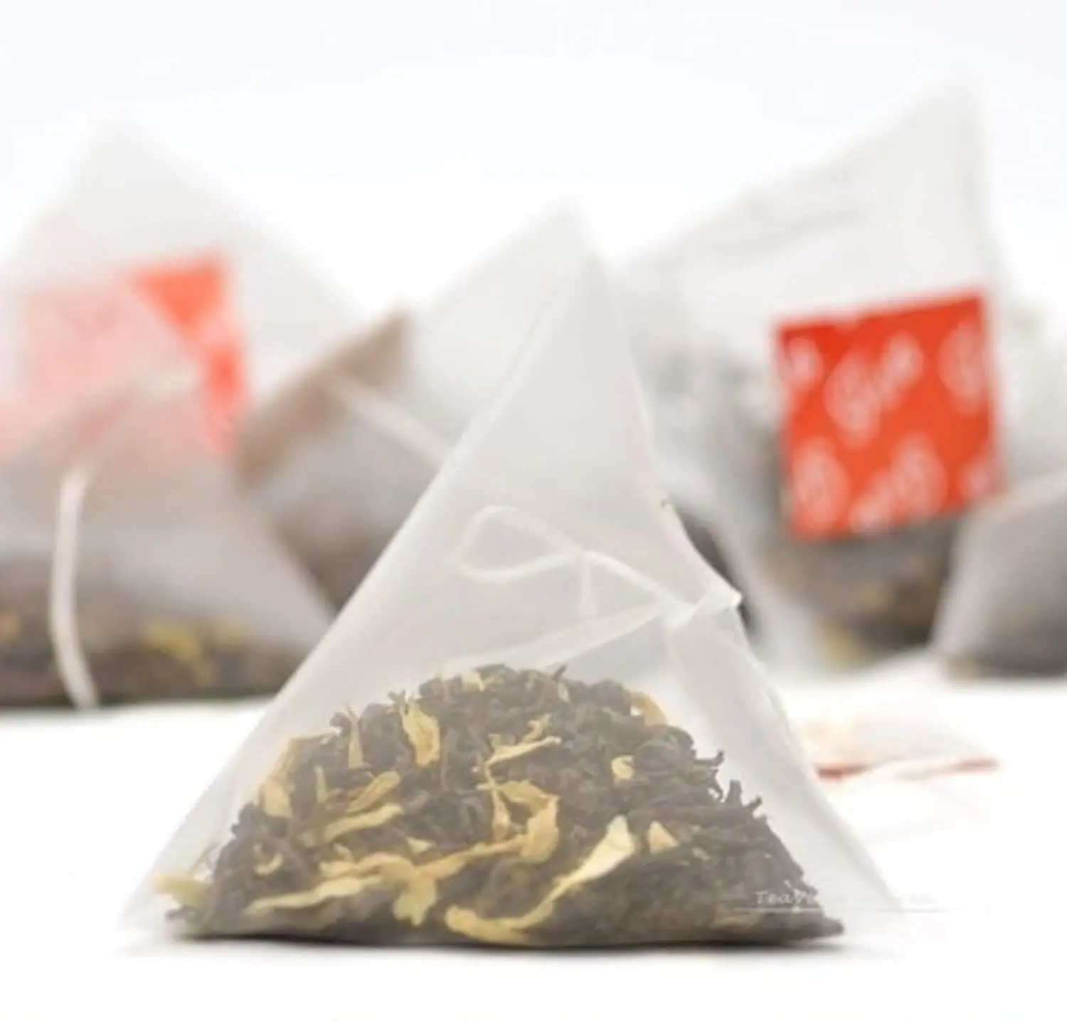 Organic 100% natural OEM Biodegradable NYLON PYRAMID TEA BAG with thread and tag for long leaf tea from India