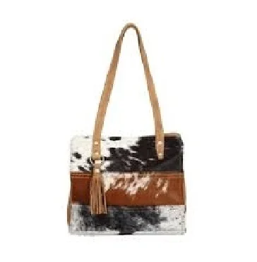 
 Кожаные сумочки из коровьей шерсти  