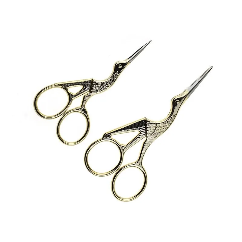 Необычные ножницы с вышивкой и рукояткой