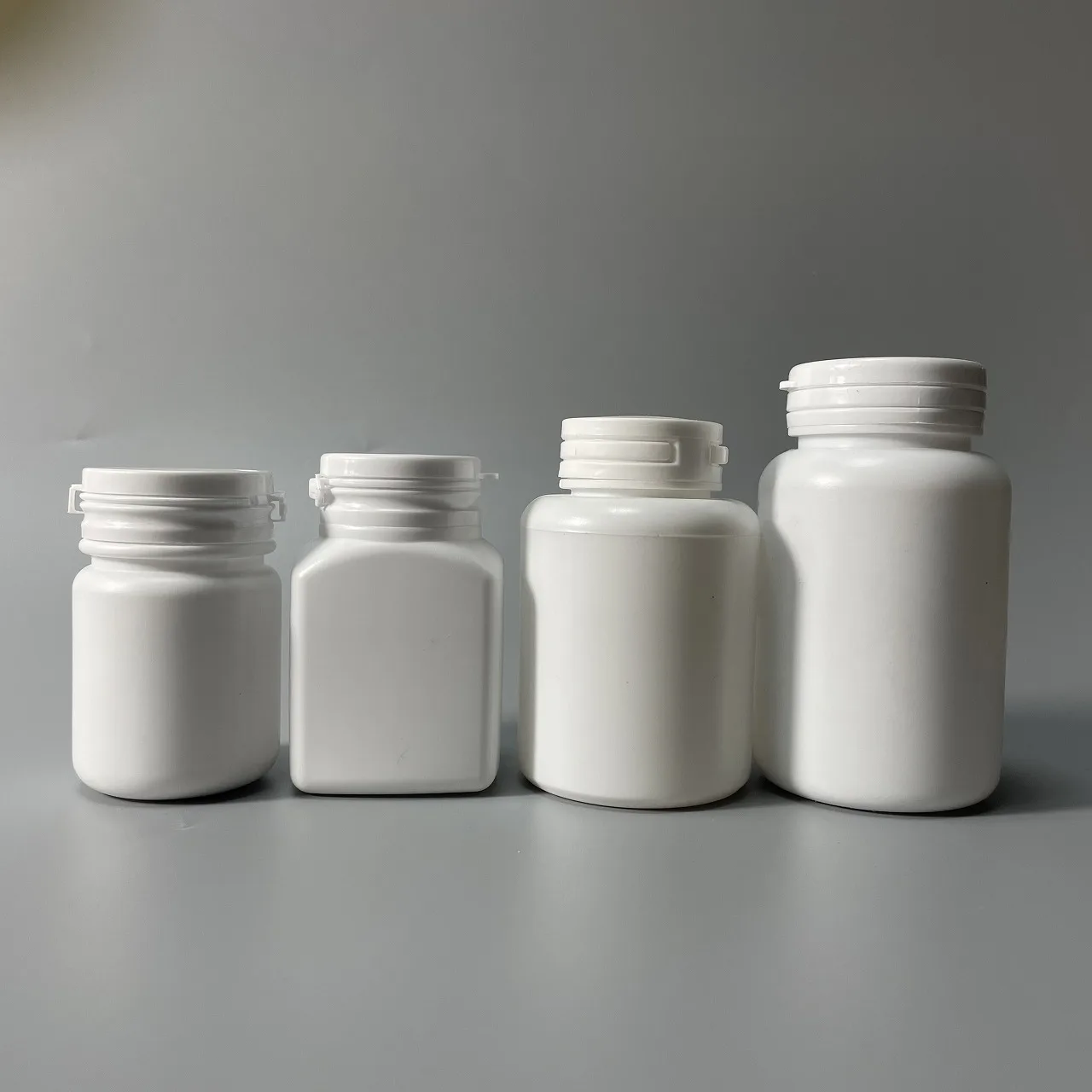 HDPE plastic chewing gum bottle empty pharmaceutical pill capsule bottle with tear off cap