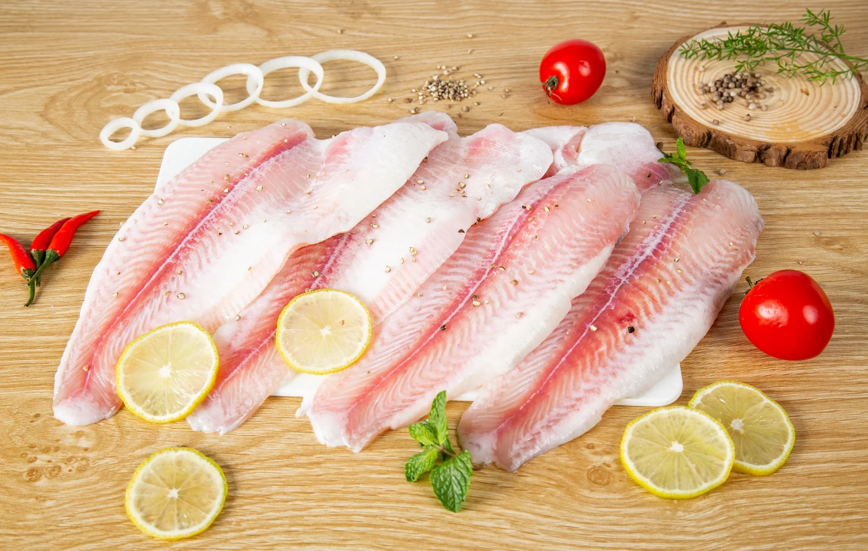 100% Natural Fresh Fish Light Pink High Quality Semi Trimmed Fillet IQF Frozen fish seafood pangasius fillet made in Vietnam