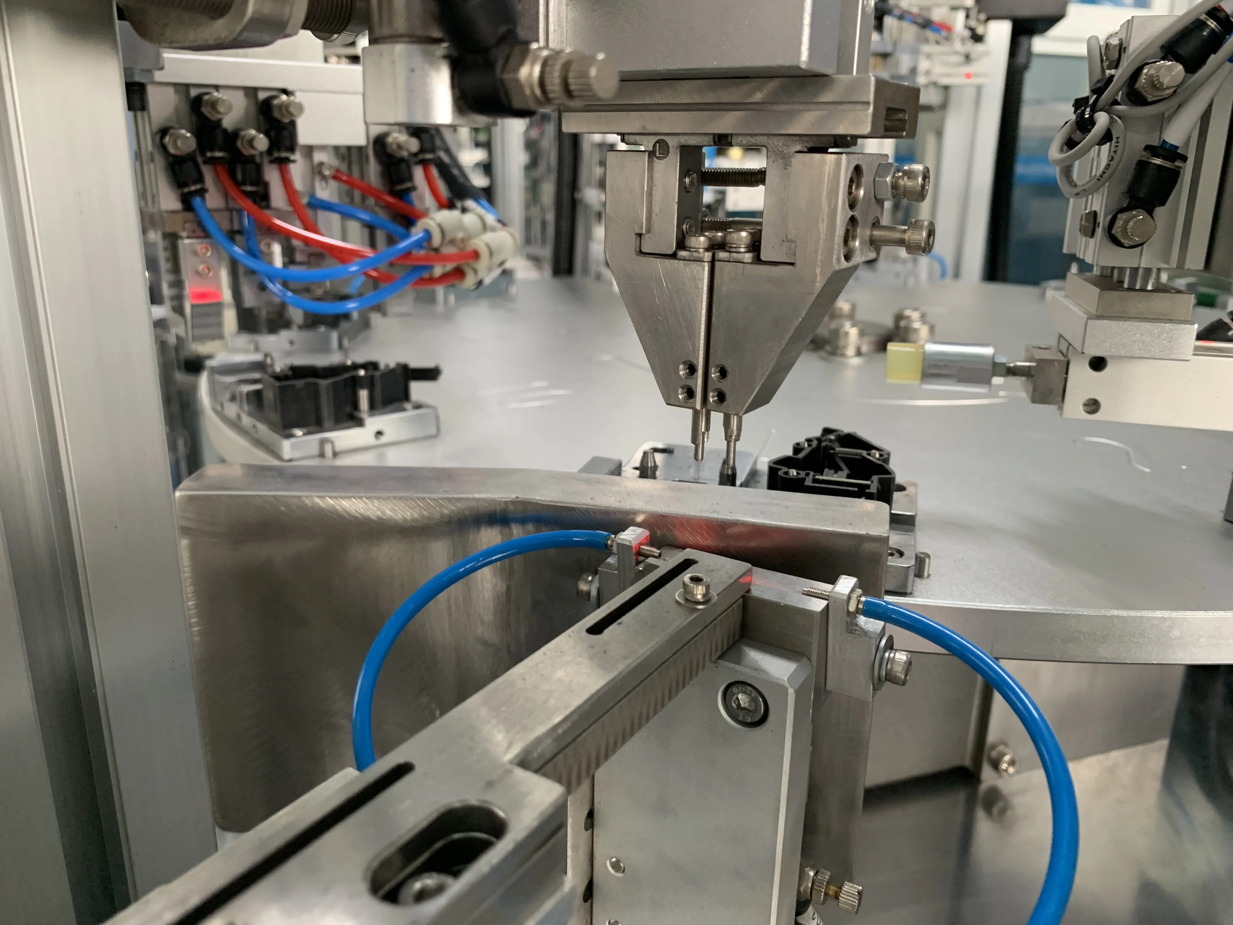 New Automated Machine for Sweeping Robot Collision Switch Assembly Production