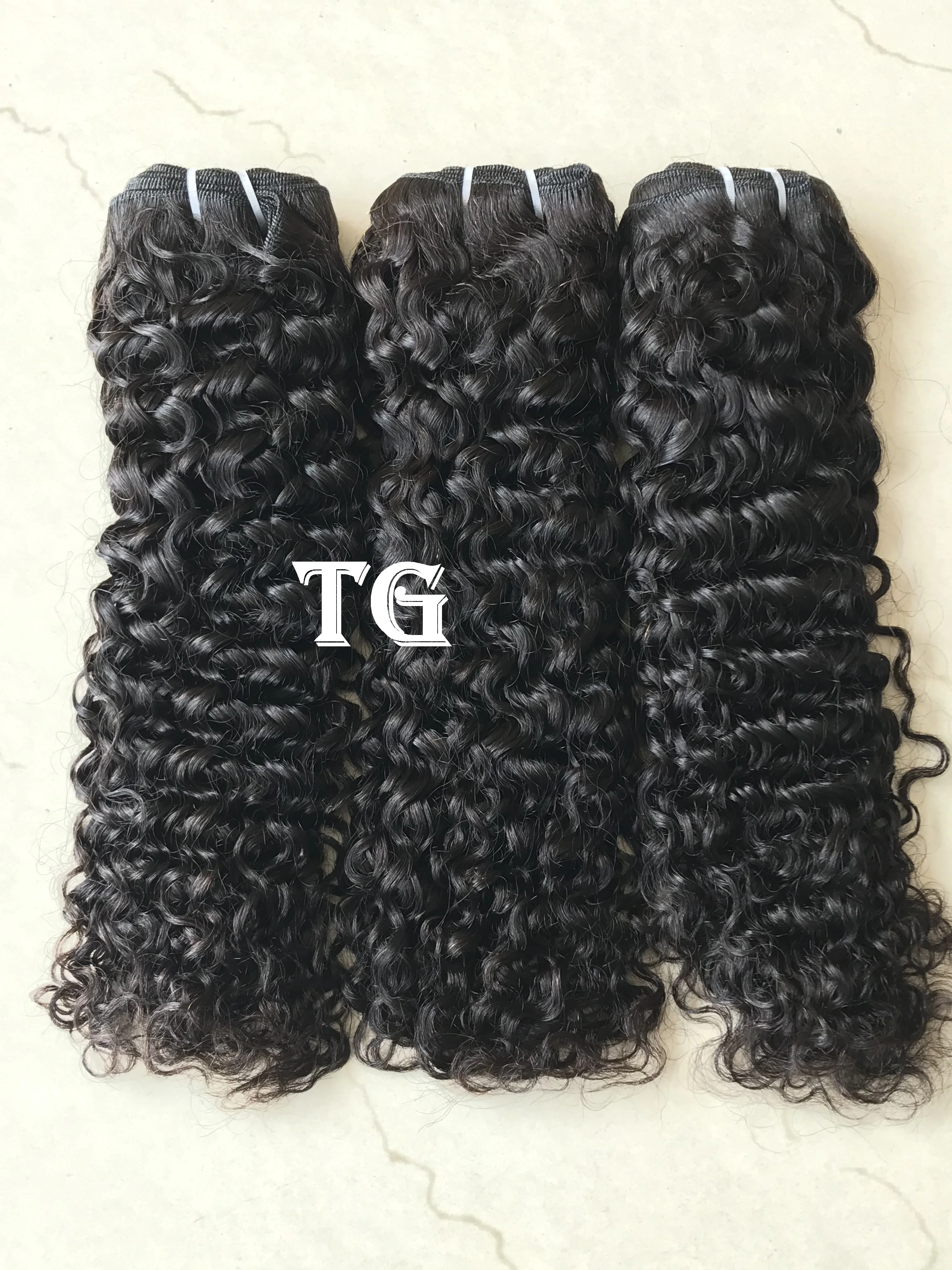 Malaysian  weft bundles kinky curly long length super price raw temple human hair extension