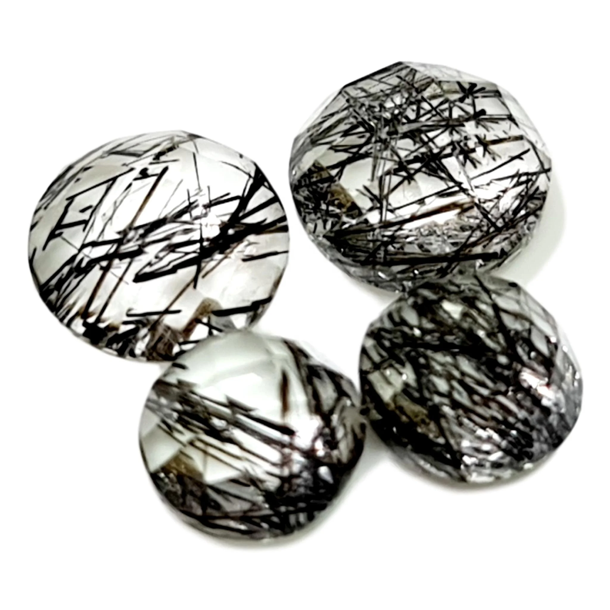 
Черный Рутиловый драгоценный камень розового цвета 