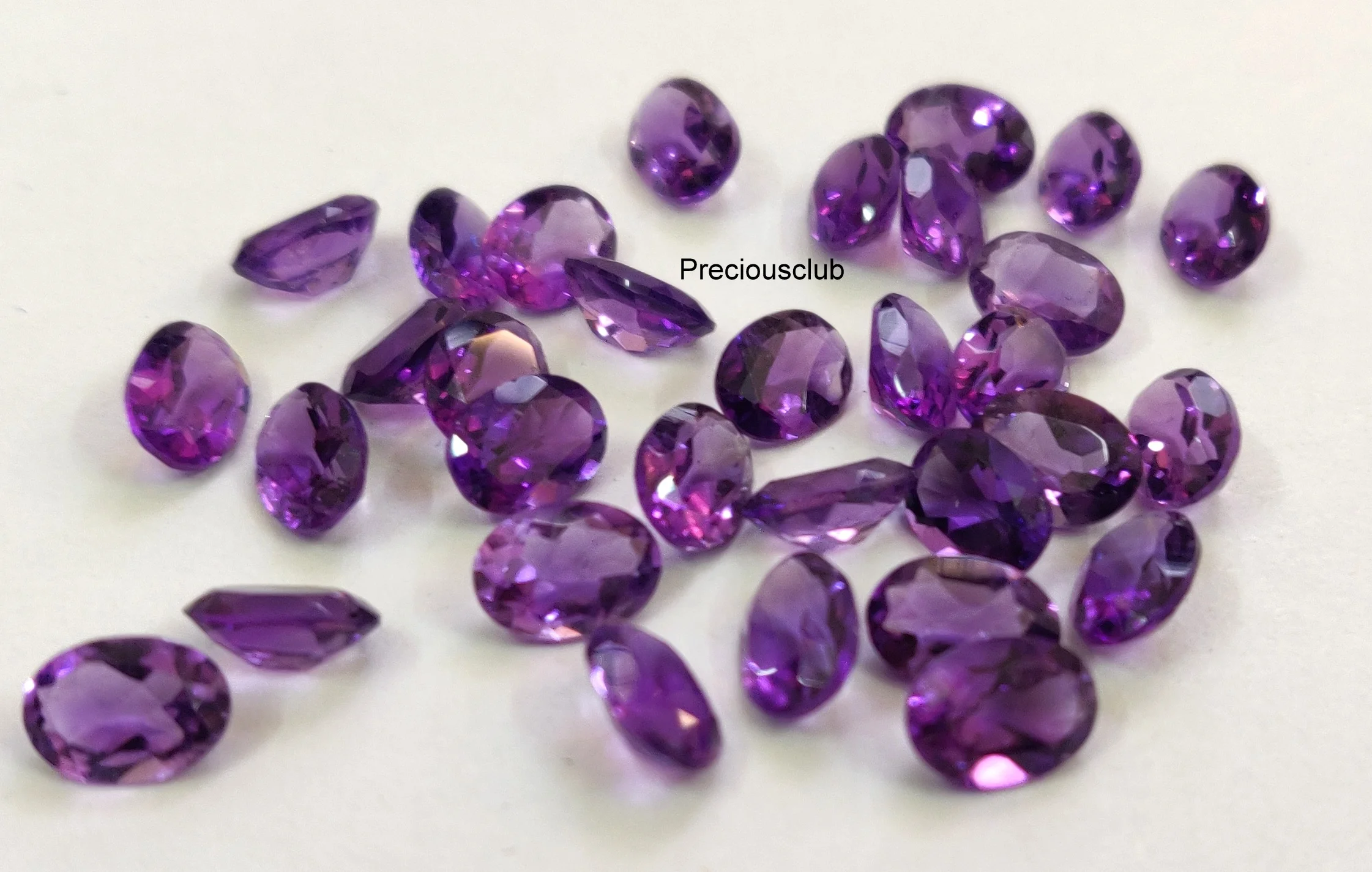Натуральный аметист овальный 3x4 мм до 10x14 граненый-свободный Аметист высшего качества