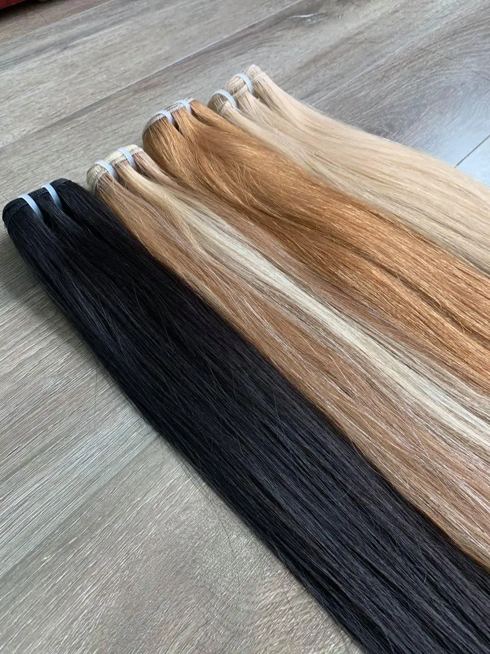 Лучший продавец натуральные черные человеческие волосы шелковистые мягкие вьетнамские легко сделать парики оптовая продажа низкая цена